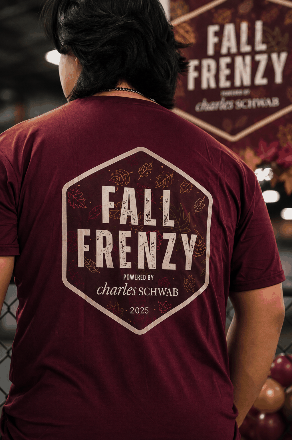 Tournament player wearing the Fall Frenzy event shirt at ERA Pickleball